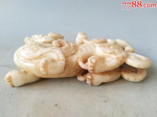 一件乡下收的明代和田白玉古兽摆件